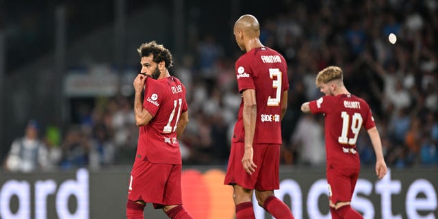 Mohamed Salah of Liverpool reacts after Andre-Frank Zambo Anguissa (not pictured) of SSC Napoli scores his team's second goal during a UEFA Champions League Group A match at Stadio Diego Armando Maradona Sept. 7, 2022, in Naples, Italy. 