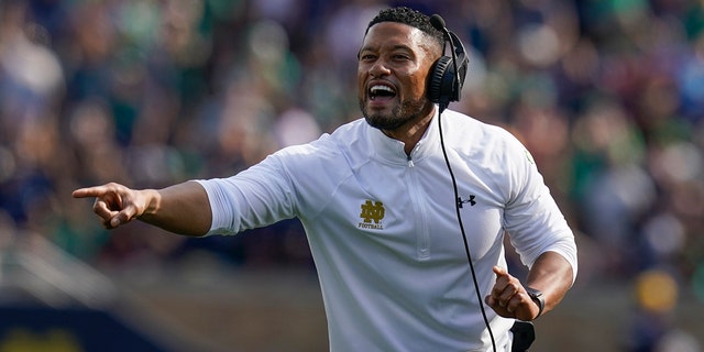 Notre Dame head coach Marcus Freeman yells to his team as they play Marshall during the second half of an NCAA college football game in South Bend, Ind., Saturday, Sept. 10, 2022. Marshall defeated Notre Dame 26-21. 