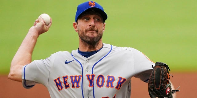 Max Scherzer of the New York Mets pitches against the Braves, July 11, 2022, in Atlanta.