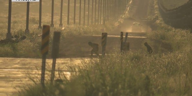 Migrants were seen running into the U.S. at the border in Naco, Arizona, in exclusive Fox News video taken on Tuesday, Sept. 13, 2022.