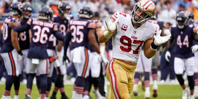 San Francisco 49ers' Nick Bosa celebrates his sack of the Bears' Justin Fields, Sunday, Sept. 11, 2022, in Chicago.