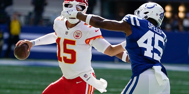 Kansas City Chiefs quarterback Patrick Mahomes is chased by Colts' E.J. Speed, Sunday, Sept. 25, 2022, in Indianapolis.