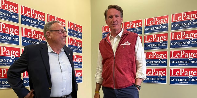 Republican Gov. Glenn Youngkin of Virginia (right) and former Maine Gov. Paul LePage (left), the 2022 GOP gubernatorial nominee in Maine, speak with reporters, on Sept. 7, 2022 in Lewiston, Maine.