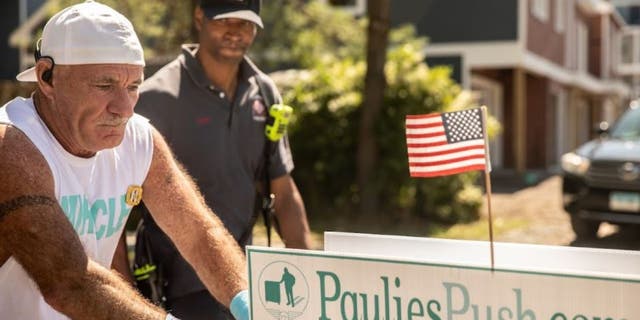 Paul Veneto pushes beverage cart to bring attention to 9/11 flight attendants