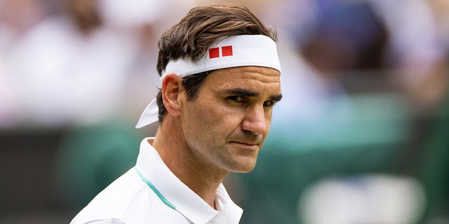 Roger Federer of Switzerland in action during a men's singles quarterfinal match against Hubert Hurkacz of Poland at Wimbledon July 7, 2021, in London.