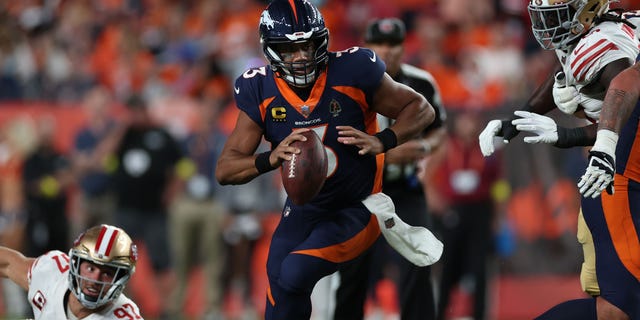 Russell Wilson #3 of the Denver Broncos rushes during the first half against the San Francisco 49ers at Empower Field At Mile High on Sept. 25, 2022 in Denver, Colorado.