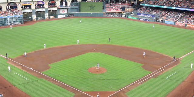 The Los Angeles Dodgers use a defensive shift during a game against the Houston Astros at Minute Maid Park in Houston, Texas, on May 26, 2021.