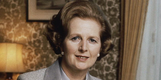 In this 1980 file photo, British Prime Minister Margaret Thatcher poses for a photograph in London. Truss has frequently been compared to Britain's Iron Lady.