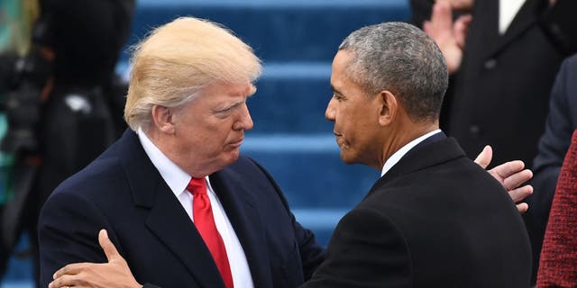 FILE: U.S. President Donald Trump, left, shakes hands with former President Barack Obama, during the 58th presidential inauguration in Washington, D.C., U.S., on Friday, Jan. 20, 2017. Photographer: Pat Benic/Pool via Bloomberg