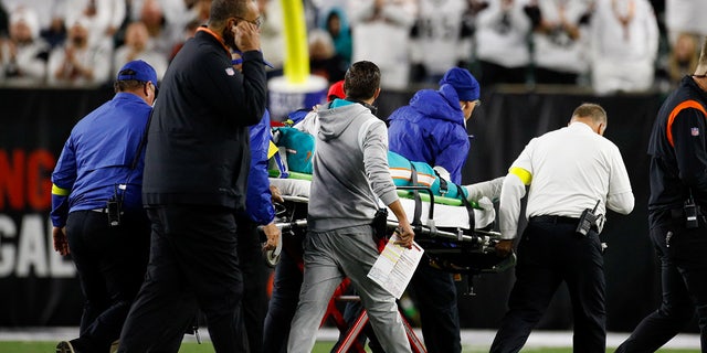 Miami Dolphins quarterback Tua Tagovailoa (1) is carted off the field during the first half in the game against the Miami Dolphins and the Cincinnati Bengals on September 29, 2022, at Paycor Stadium in Cincinnati, OH.