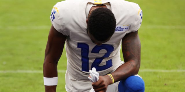 Van Jefferson of the Los Angeles Rams kneels before the game against the Baltimore Ravens at M and T Bank Stadium in Baltimore, Maryland, on Jan. 2, 2022.