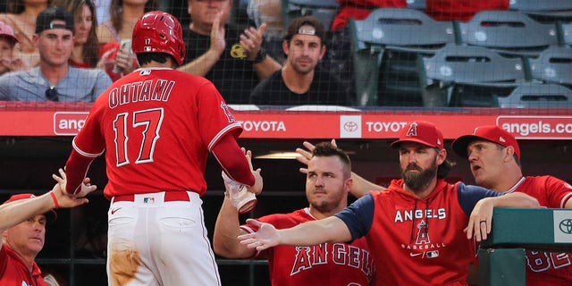 Shohei Ohtani #17 of the Los Angeles Angels celebrates scoring a run in the first inning against the Detroit Tigers at Angel Stadium of Anaheim on September 05, 2022, in Anaheim, California.