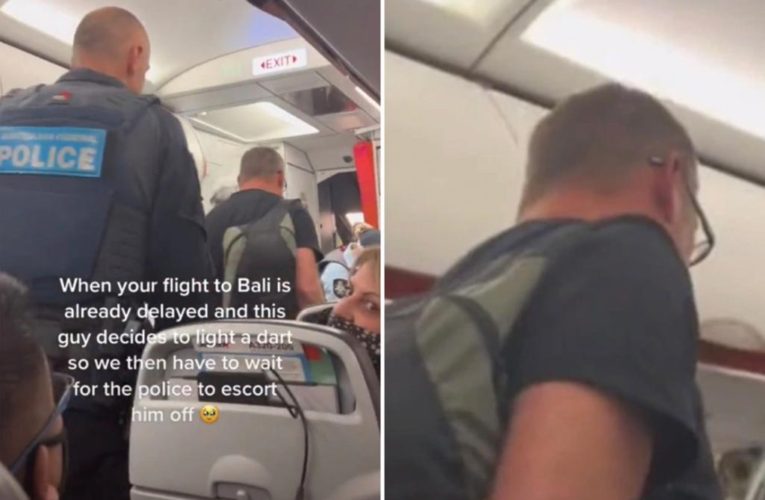 Jetstar passenger yanked from Bali flight after lighting cigarette on plane