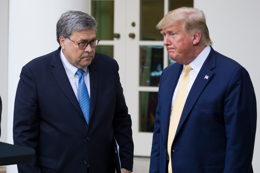 n this July 11, 2019, file photo, Attorney General William Barr, left, and President Donald Trump turn to leave after speaking in the Rose Garden of the White House, in Washington.