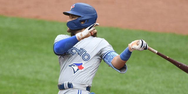 Bo Bichette #11 of the Toronto Blue Jays hits a three-run home run in the third inning during game two of a doubleheader baseball game against the Baltimore Orioles at Oriole Park at Camden Yards on September 5, 2022 in Baltimore, Maryland. 