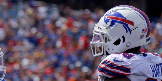 Duke Johnson of the Buffalo Bills celebrates a touchdown with Bobby Hart, right, of the Buffalo Bills during the second half of a preseason game against the Denver Broncos at Highmark Stadium Aug. 20, 2022, in Orchard Park, N.Y.