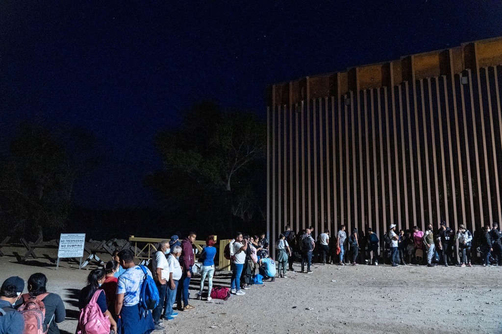 Detained migrants and asylum seekers at a US border crossing — one of many such entry points where fentanyl enters the country before being trucked north and east. 