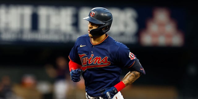 Carlos Correa of the Minnesota Twins rounds the bases after a solo home run against the Kansas City Royals at Target Field Sept. 15, 2022, in Minneapolis.