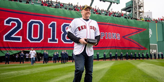 Retired pitcher Curt Schilling of the Boston Red Sox is introduced during a 2018 World Series championship ring ceremony before the Opening Day game against the Toronto Blue Jays April 9, 2019, at Fenway Park in Boston.