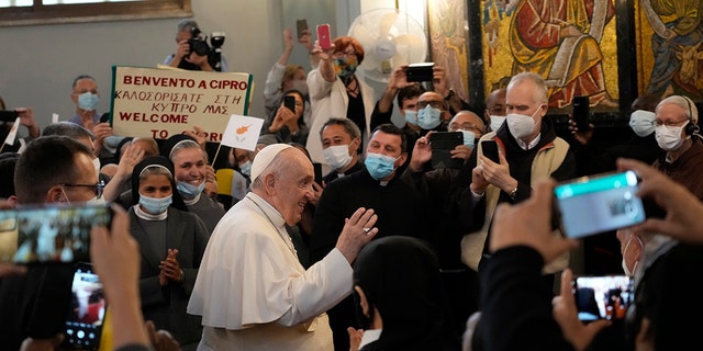 Pope Francis arrives to attend a ceremony at the Maronite Cathedral of Our Lady of Graces in Nicosia, Cyprus, Dec. 2, 2021.