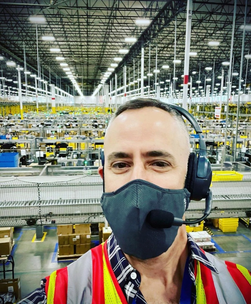 Ambroz is seen in an Amazon warehouse. His new book is set for release later this month. 