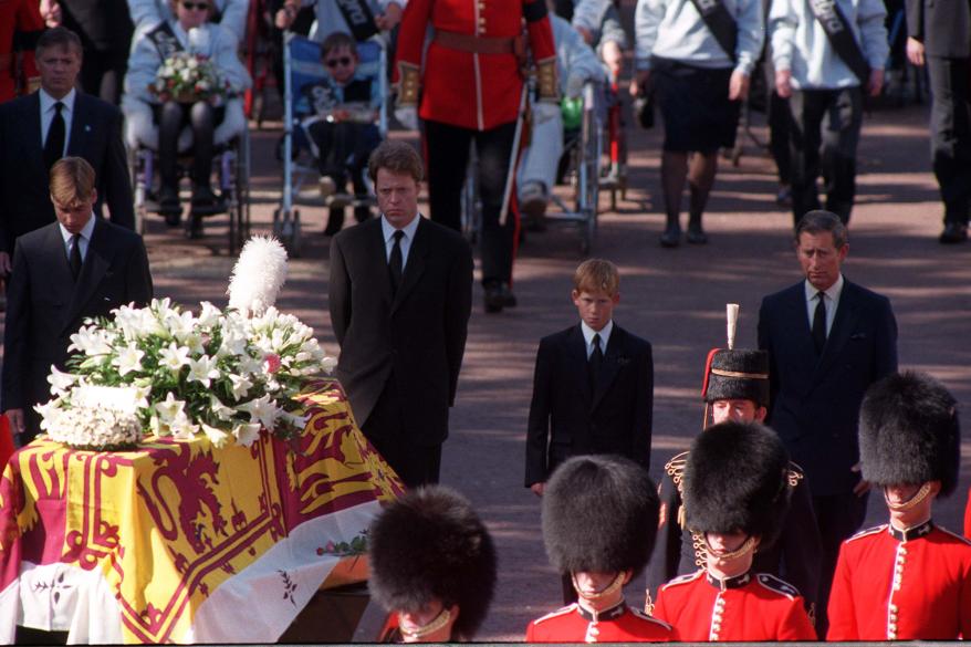 Young Princes William and Harry at Princess Diana's funeral procession.