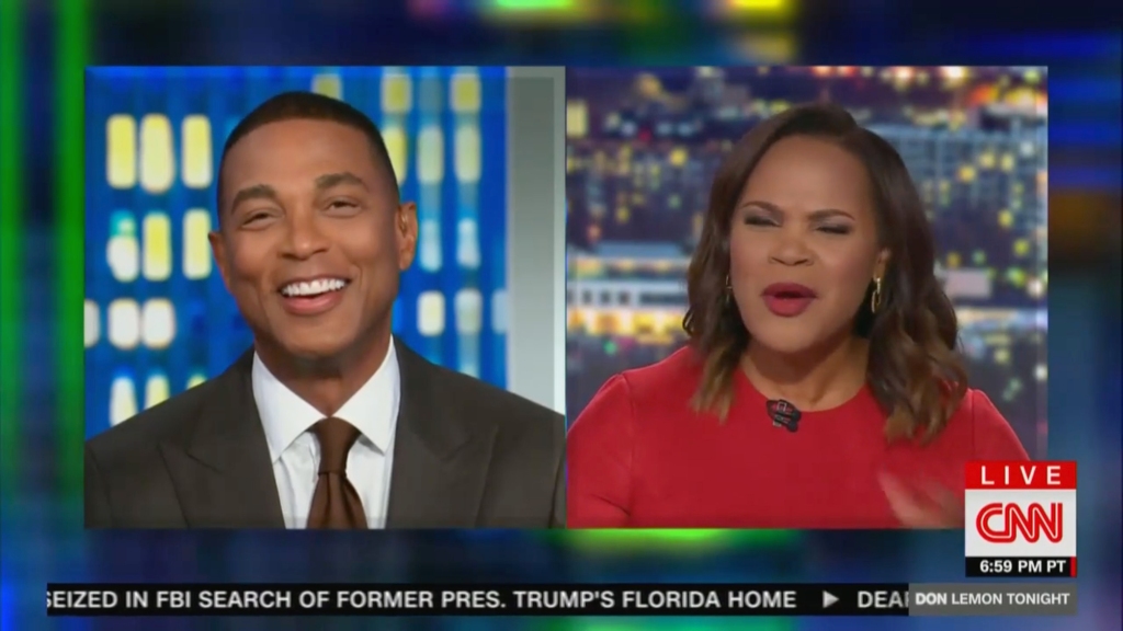 Don Lemon on a split screen with Laura Coates during the handoff. 