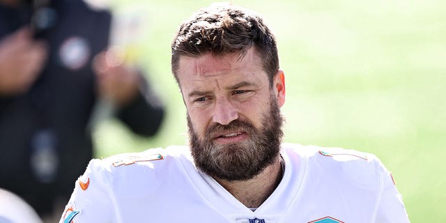 Ryan Fitzpatrick of the Miami Dolphins warms up prior to a game against the New York Jets at MetLife Stadium Nov. 29, 2020, in East Rutherford, N.J.