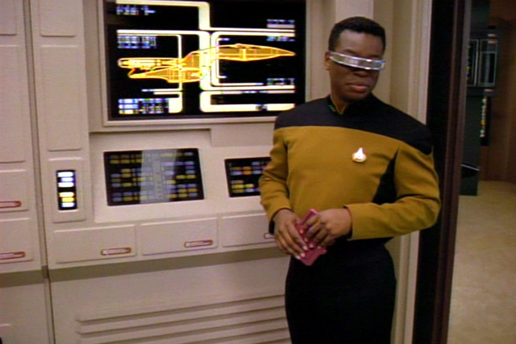 American actor LeVar Burton (as Lieutenant Commander Geordi La Forge) in a scene from an episode of the television series 'Star Trek: The Next Generation' entitled 'Liaisons,' California, September 27, 1993. 