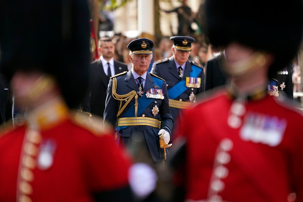 King Charles III follows the coffin of his late mother, Queen Elizabeth II, during a procession from Buckingham Palace to Westminster Hall on Wednesday.