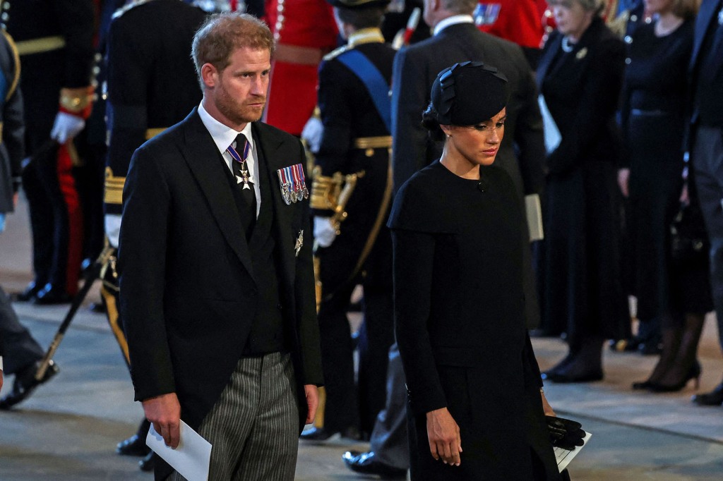 Prince Harry and Meghan Markle attend a service for the reception of Queen Elizabeth II's coffin at Westminster Hall on Wednesday.