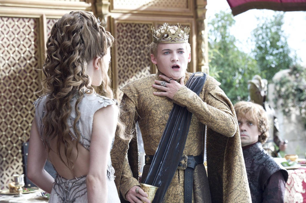 Natalie Dormer with Jack Gleeson clutching his throat. 