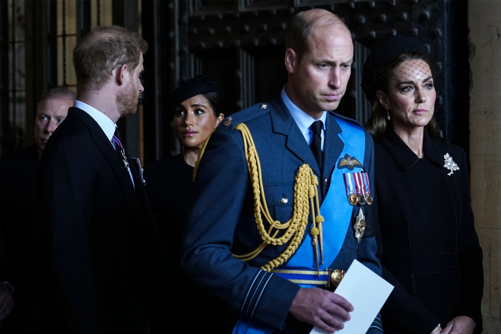 Prince William, Catherine and Prince Harry and Meghan Markle leave after escorting the coffin of Queen Elizabeth II to Westminster Hall from Buckingham Palace in London on Sept. 14, 2022.