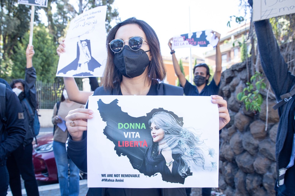 People protest in front of Iran’s embassy in Rome, Italy on Sept. 23, 2022.