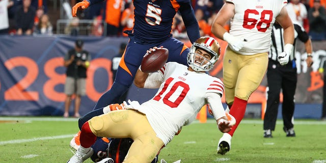 Bradley Chubb (55) of the Denver Broncos sacks Jimmy Garoppolo (10) of the San Francisco 49ers during the fourth quarter of a game at Empower Field At Mile High Sept. 25, 2022, in Denver, Colo.