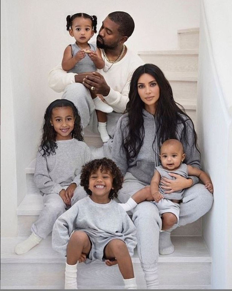 West and Kim Kardashian's children (clockwise from bottom: Saint, North, Chicago with West and Psalm with Kardashian) currently do not attend the Donda Academy.