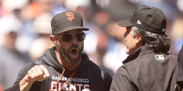 San Francisco Giants manager Gabe Kapler argues with umpire Phil Cuzzi during the sixth inning of the game against the Los Angeles Dodgers at Oracle Park on Aug. 4, 2022, in San Francisco.