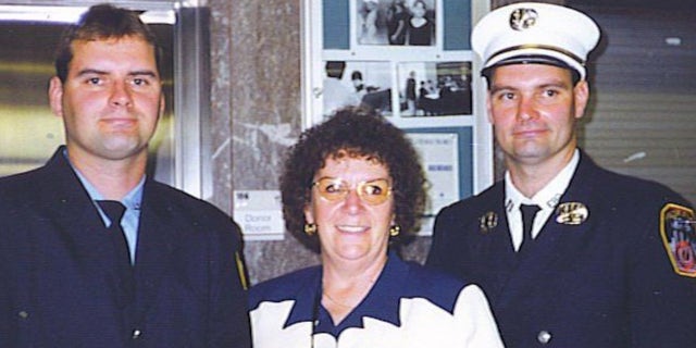 Ken and Tommy Haskell with their mother in their FDNY dress uniforms.