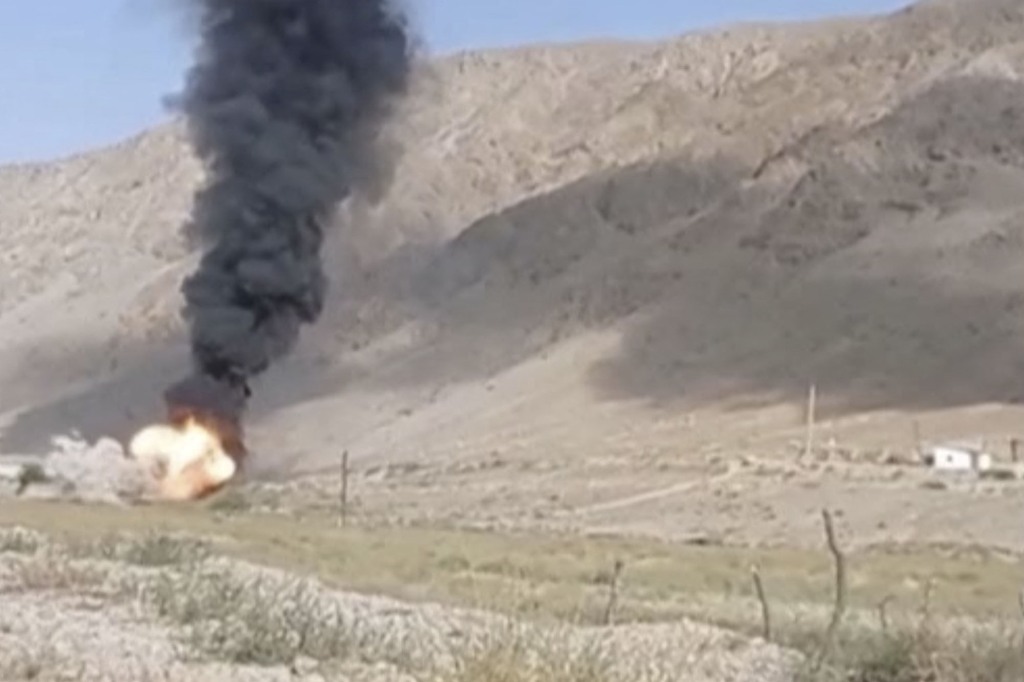 A still image from video, released by the Kyrgyz border guard service, shows what it said to be active military confrontation on Kyrgyz-Tajik border as seen from an unidentified location in the Batken region, Kyrgyzstan, in this still image taken from handout footage released September 16, 2022. 