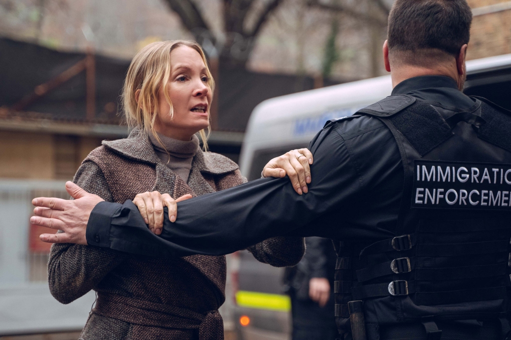 Joanne Froggatt being detained by an immigration officer. 