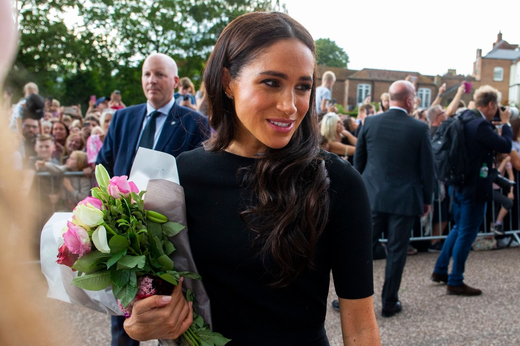 Markle's popularity in the UK remains low, but she received a mostly warm welcome from mourners outside Windsor Castle. 