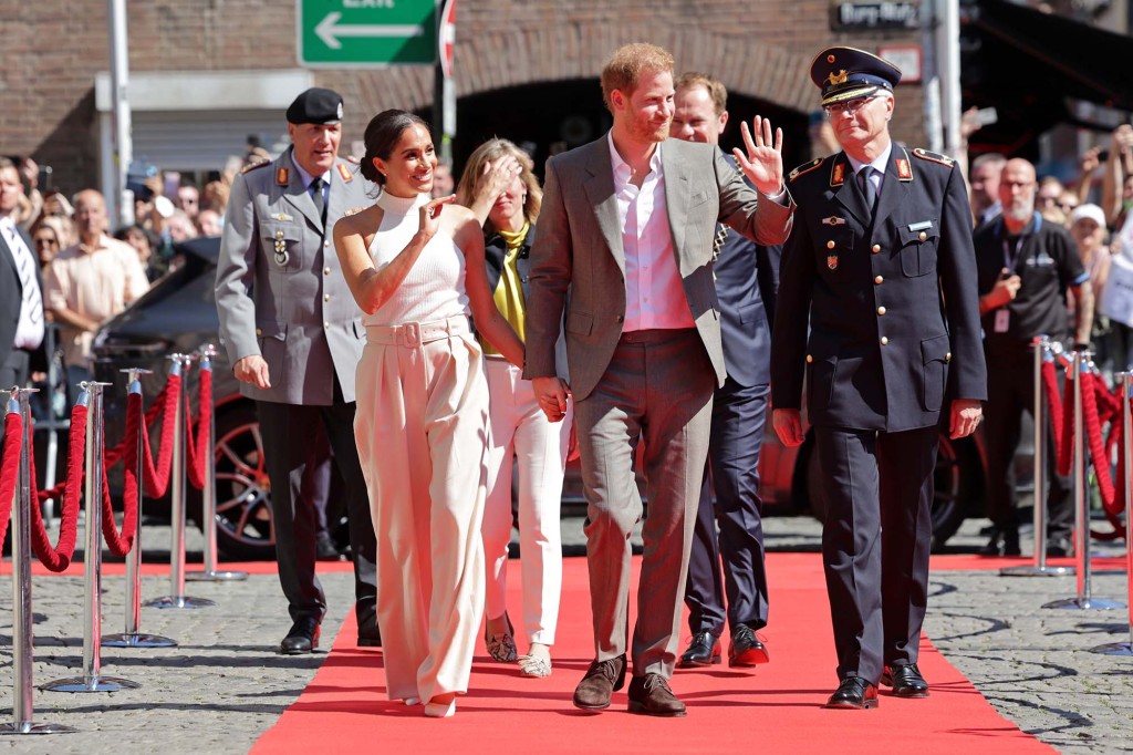 Markle and Prince Harry greet crowds in Germany