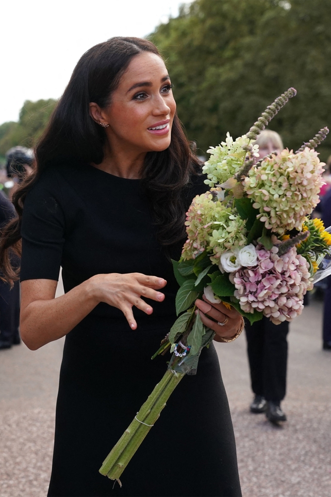 The Princess of Wales Kate Middleton, the Prince of Wales Prince WIllian and the Duke and Duchess of Sussex Prince Harry and Meghan Markle meeting members of the public at Windsor Castle in Berkshire following the death of Queen Elizabeth II on Thursday.