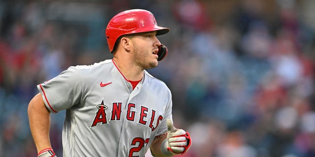 Mike Trout #27 of the Los Angeles Angels rounds the base on his two-run home run in the fifth inning against the Cleveland Guardians at Progressive Field on September 12, 2022 in Cleveland, Ohio. 