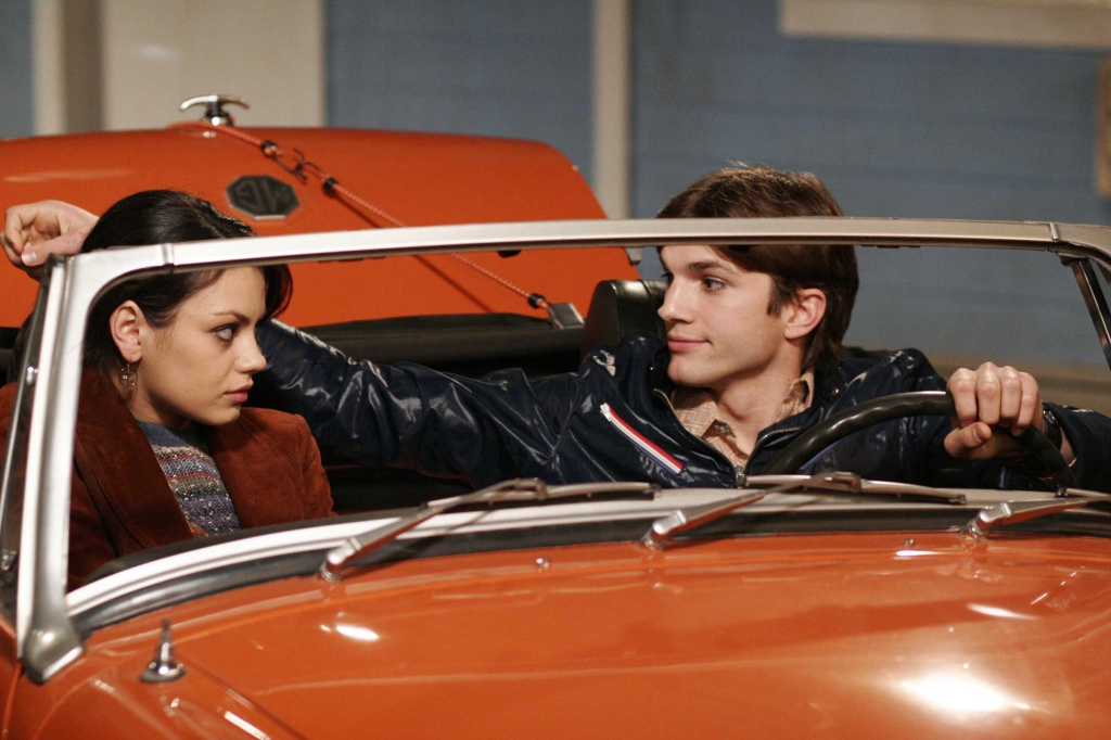 Kelso (Ashton Kutcher, R) comes to Jackie's (Mila Kunis, L) rescue in the THAT '70s SHOW one-hour season finale "Til The Next Goodbye" airing Wednesday, May 18 