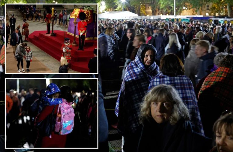 Line to see Queen’s coffin reaches 24-hour wait as mourners brave cold night