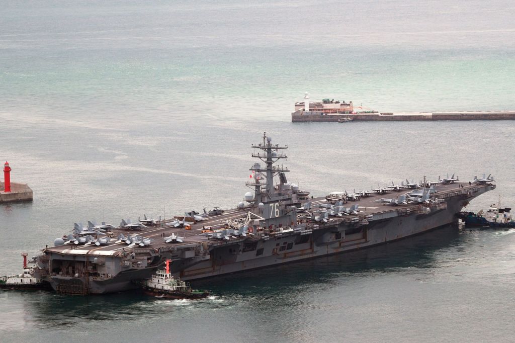 U.S. aircraft carrier USS Ronald Reagan leaves from a port in Busan, South Korea on Sept. 26, 2022.