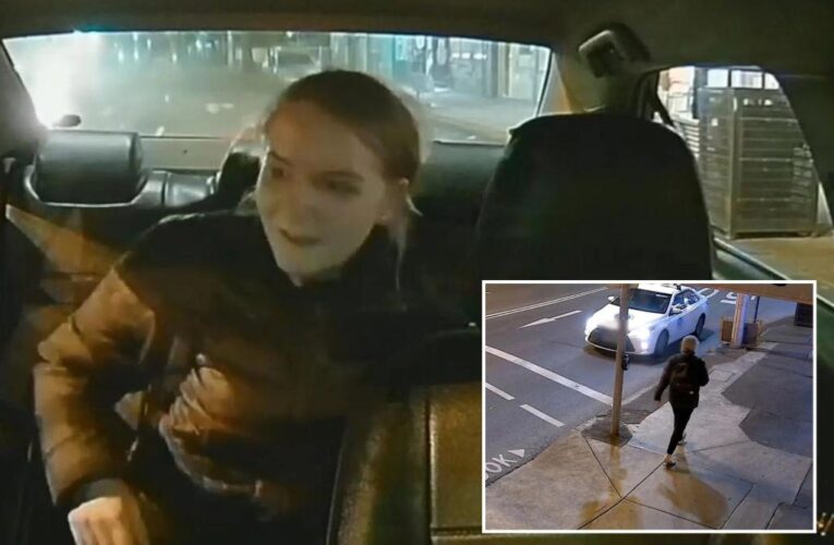 Woman who carjacked taxi driver at knifepoint captured on video