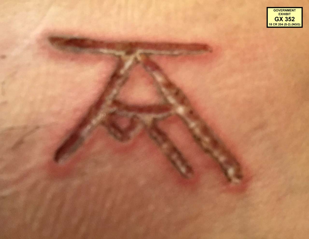 Nxivm logo with Keith Raniere’s initials