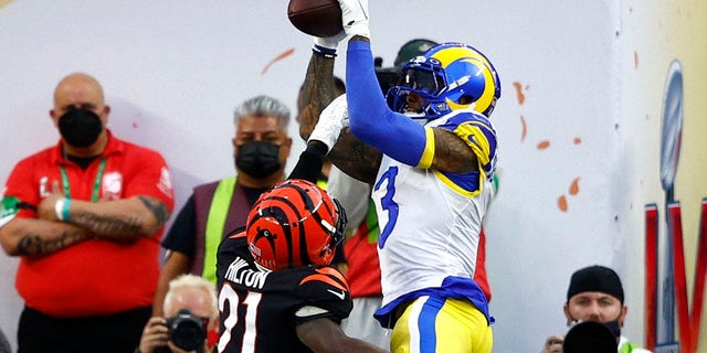 Odell Beckham Jr. of the Los Angeles Rams makes a catch over Mike Hilton of the Cincinnati Bengals for a touchdown during the first quarter of Super Bowl LVI at SoFi Stadium in Inglewood, California, on Feb. 13, 2022.